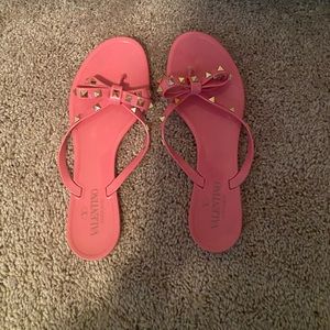 Pink/Gold Valentino studded flip flops. Used. Great condition.